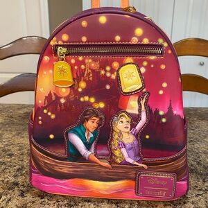 Loungefly Tangled Rapunzel & Flynn Boat Scene Glow-In-The Dark Mini Backpack.
